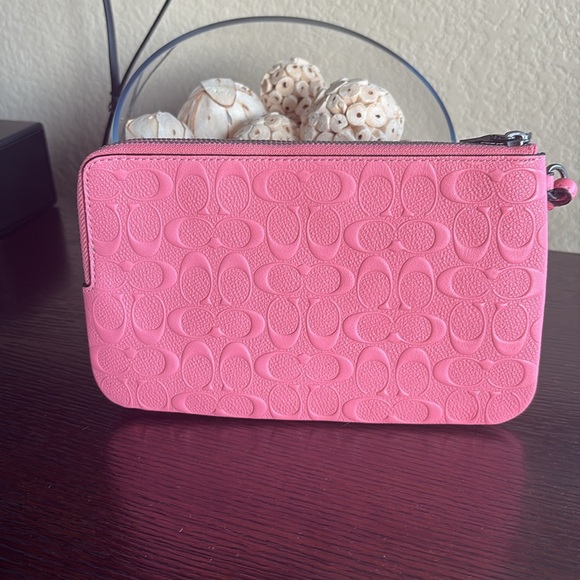 Coach Embossed Pink Wristlet - Picture 5 of 10
